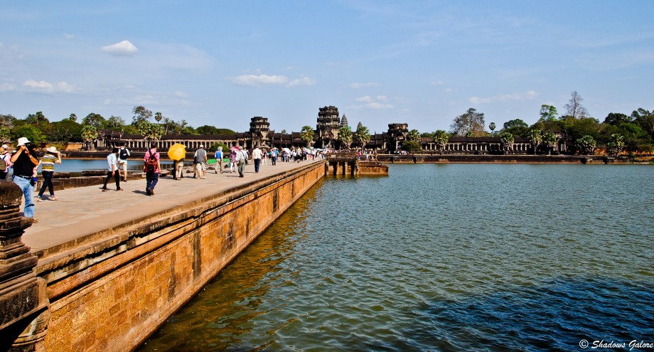 The Moat and the bridge leading to Angkor Wat The Moat and the bridge leading to Angkor Wat